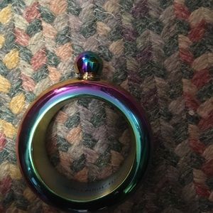 a colorful bracelet that is also a flask